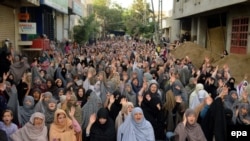 FILE: Members of Pakistan's Hazara community protest against attacks in Quetta, Balochistan.