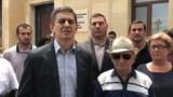 Azerbaijani opposition leader Ali Karimli (center left) was placed in pre-trial detention on December 1, over alleged coup attempt. (file photo)
