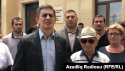 Azerbaijani opposition leader Ali Karimli (center left) was placed in pre-trial detention on December 1, over alleged coup attempt. (file photo)