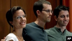 Sarah Shourd, Shane Bauer, and Josh Fattal at a news conference in New York following the men's release from Iranian detention late last week.