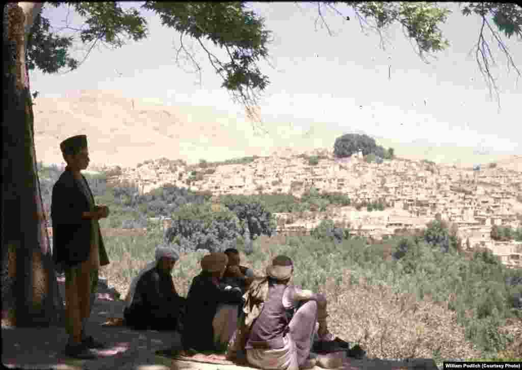 Afghan men gaze out over the village of Istalif, some 30 kilometers northwest of Kabul.