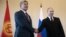 Қирғизистон президенти Алмазбек Атамбаев ва Россия президенти Владимир путин учрашув чоғида.