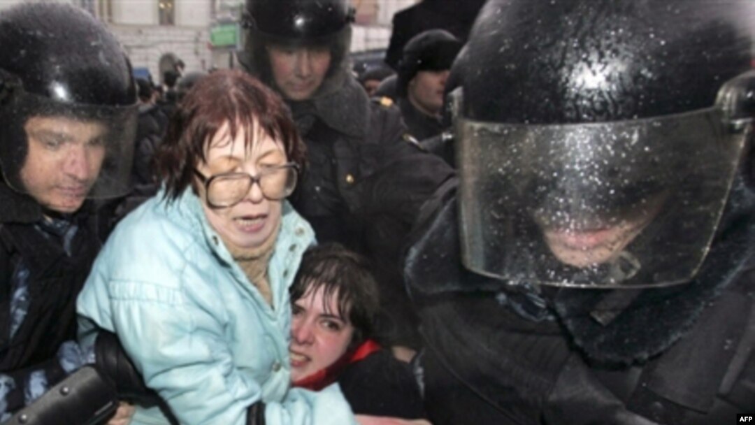 Russian riot police detain opposition activists during a rally in Moscow in March.