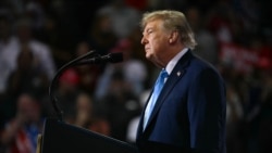 US President Donald Trump speaks at a midterm campaign rally at Truist Arena in Highland Heights, Kentucky on October 17, 2026.