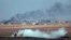 Smoke billows from targets inside Syria during bombardment by Turkish forces on October 9.