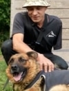 Ukrainian Amputee Veteran Finds Solace In Caring For Dogs GRAB