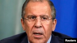 Ռուսաստանի արտգործնախարար Սերգեյ Լավրովը ասուլիսի ժամանակ, Մոսկվա, 25-ը հունիսի, 2013թ.