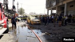 Місце вибуху замінованого автомобіля біля урядового установи в районі аль-Карх у Багдаді, Ірак, 30 травня 2017 року