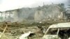 YUGOSLAVIA -- A general view showing the rubble and damage as seen from the parking lot of the Novi Sad TV station, destroyed during last night's NATO air raid, in Novi Sad, May 13, 1999