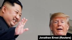 Ким Чен Ын менен Дональд Трамп Сингапурдагы саммитте. 12-июнь, 2018-жыл.