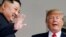 Кім Чен Ин (ліворуч) і Дональд Трамп (праворуч) у Сінгапурі, 12 червня 2018 року
