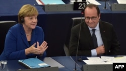 Merkel dhe Hollande