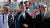 Outgoing Afghan President Hamid Karzai (center) with rival presidential candidates Abdullah Abdullah (right) and Ashraf Ghani (left) in Kabul on August 19.