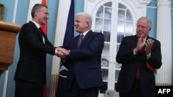 НАТОнун баш катчысы Йенс Столтенберг жана Монтенегронун премьер-министри Душко Маркович.
