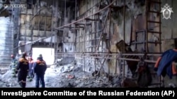 The Investigative Committee of the Russian Federation screen grab shows the consequences of a fire inside the multistory shopping center after a fire, in the Siberian city of Kemerovo, on March 27, 2018.