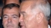 Looking over his shoulder? Uzbek President Islam Karimov (right) and Medvedev at a recent regional gathering