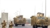 British soliders patrol around the airport of the southern city of Al-Basrah