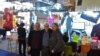 Maria Pilchin cu scritorul Norman Manea și soția sa la Salonul de Carte de la Paris