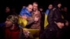 Ukrainian POWs react after a prisoner swap at an unknown location in Ukraine earlier this year. 