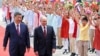 Xi, Putin și copii chinezi la ceremonia de primire a liderului rus la Beijing, pe 20 mai 2026. 
