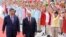 Xi, Putin și copii chinezi la ceremonia de primire a liderului rus la Beijing, pe 20 mai 2026. 