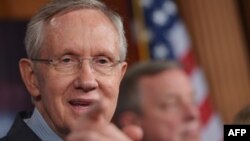 U.S. Senate Majority Leader Harry Reid (in file photo) said the agreement would fund the U.S. government through January 15 and avert a debt default through February 7.