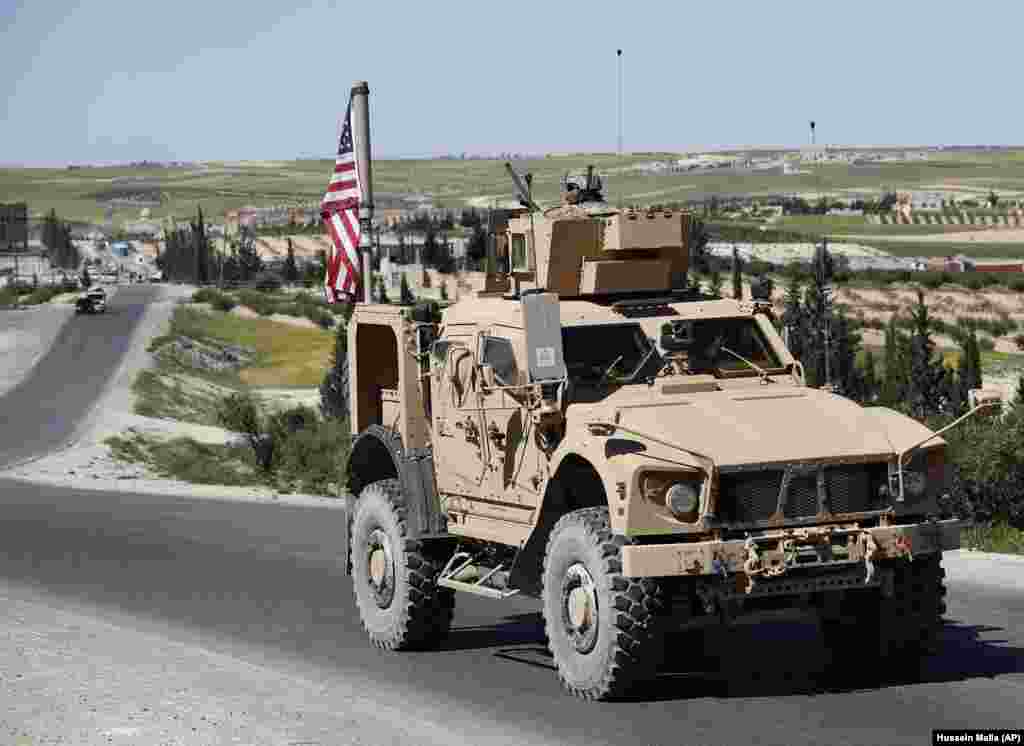A U.S. vehicle near Manbij in April 2018. On December 19, U.S. President Donald Trump declared it was time for American troops "to come back home." The statement led to a flurry of criticism that the move would embolden IS, with one Republican senator saying a withdrawal would be a mistake, claiming the Islamic State group has been "degraded" but not yet defeated. 