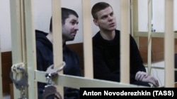 Zenit St. Petersburg soccer player Aleksandr Kokorin (left) and fellow defendant Aleksandr Protasovitsky attend a hearing in a court in Moscow on April 10. 