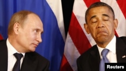 Ресей президенті Владимир Путин (сол жақта) мен АҚШ президенті Барак Обама. 18 қаңтар 2012 жыл. 