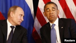 Birleşen Ştatlaryň prezidenti Barak Obama we Orsýetiň prezidenti Wladimir Putin Los Kabosda, 2012-nji ýylyň 18-nji iýuny.