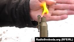 Запальничка у вигляді гранати, зроблена із патронана донецькому блошиному ринку