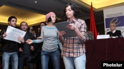 Armenia - Young civic activists denounce the findings of Western election observers during the latter's news conference in Yerevan, 19Feb2013.