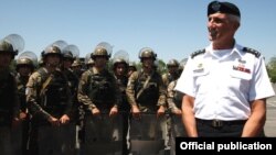 Armenia - The commander of the U.S. Army in Europe, Lieutenant General Mark Hertling (R), inspects Armenian peacekeeping troops in Yerevan, 18Jul2012.