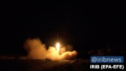 A screen grab taken from a video released by Iranian state TV purportedly shows rockets being launched from Iran against the U.S. military base in Iraq on January 7.