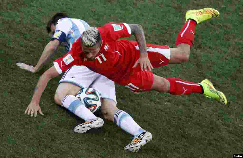 Ҷараёни бозии тимҳои футболи Аргентина ва Швейдсария дар Ҷоми ҷаҳон -2014, ки бо ҳисоби 0-1 ба фоидаи Аргентина анҷом ёфт.