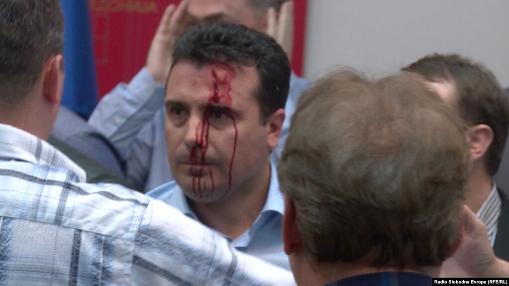 Protesters, among them masked people, attacked deputies after they stormed parliament in Skopje,including Social Democrat leader Zoran Zaev on April 27.