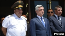 Armenia - President Serzh Sarkisian (C), Armenian police chief Vladimir Gasparian (R) and the commander of interior troops Levon Yeranosian (L) pictured together in Yerevan, 21Jun2014.