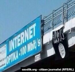 A flag of Islamic State militants hanging on the bridge in Tashkent