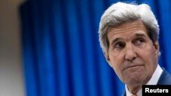 U.S. Secretary of State John Kerry is due to meet with both candidates in Kabul on July 11.