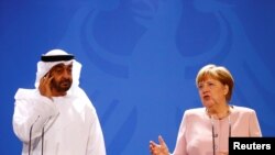 German Chancellor Angela Merkel and Abu Dhabi's Crown Prince Mohammed bin Zayed al Nahyan attend a news conference at the Chancellery in Berlin, Germany, June 12, 2019. REUTERS/Hannibal Hanschke
