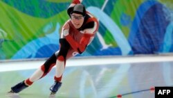 Canadian speed skater Anastasia Bucsis, who competed in Vancouver's XXI Olympic Winter Games in 2010, is openly gay but says she won't "make any fuss."