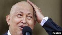 Venezuelan President Hugo Chavez joked about his lack of hair during cancer treatment while talking to reporters at Miraflores Palace in Caracas in 2011.