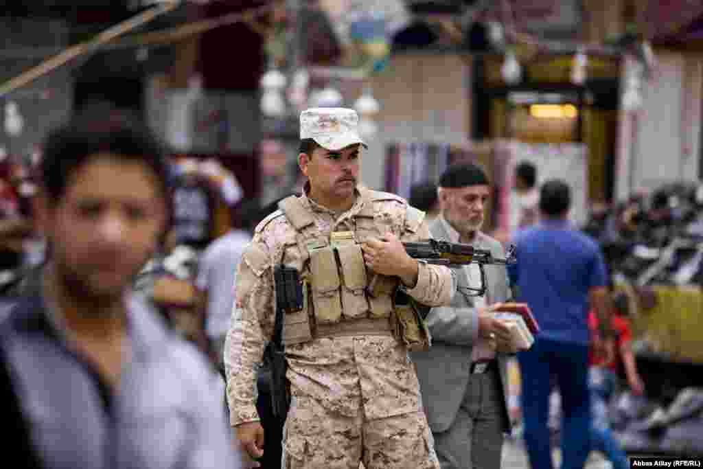 One of the oldiers guarding Imam Hussein Shrine in Karbala