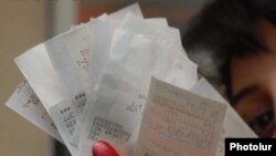 Armenia -- Receipts issued by a cash register.