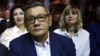 Gafur Rakhimov (right), interim president of the International Boxing Association (AIBA), attends a boxing event in Sochi, Russia, on February 3 with former AIBA President Franco Falcinelli.