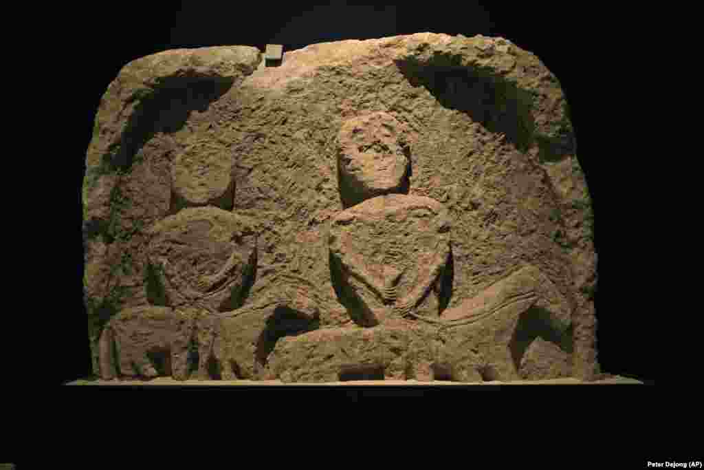 An equestrian nomad&#39;s gravestone from the first-second century A.D., is displayed as part of the exhibit called &#39;The Crimea - Gold and Secrets of the Black Sea&#39; on April 4, 2014.