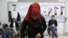 إمرأة اردنية تدلي بصوتها في الانتخابات