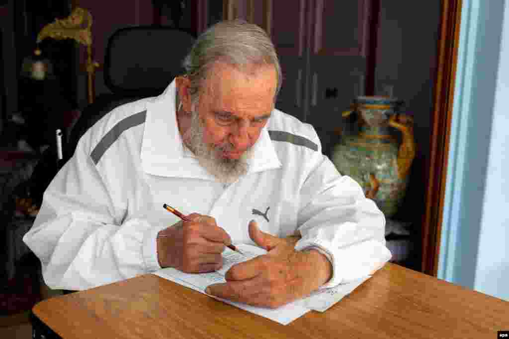 A handout picture provided by Estudios Revolucion and Cubadebate shows former Cuban President Fidel Castro, 88, casting his vote during the elections to choose local assemblies' delegates at his home in Havana on April 19. (epa/Cubdebate/Estudios Revolucion)