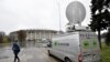 (FILES) In this file photo taken on November 11, 2017 a Russia's state-controlled Russia Today (RT) television broadcast van is seen parked outside the Luzhniki stadium ahead of an international friendly football match between Russia and Argentina in Mosc