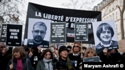 В Париже демонстрация в поддержку сатирического журнала Charlie Hebdo, 14 января 2015 